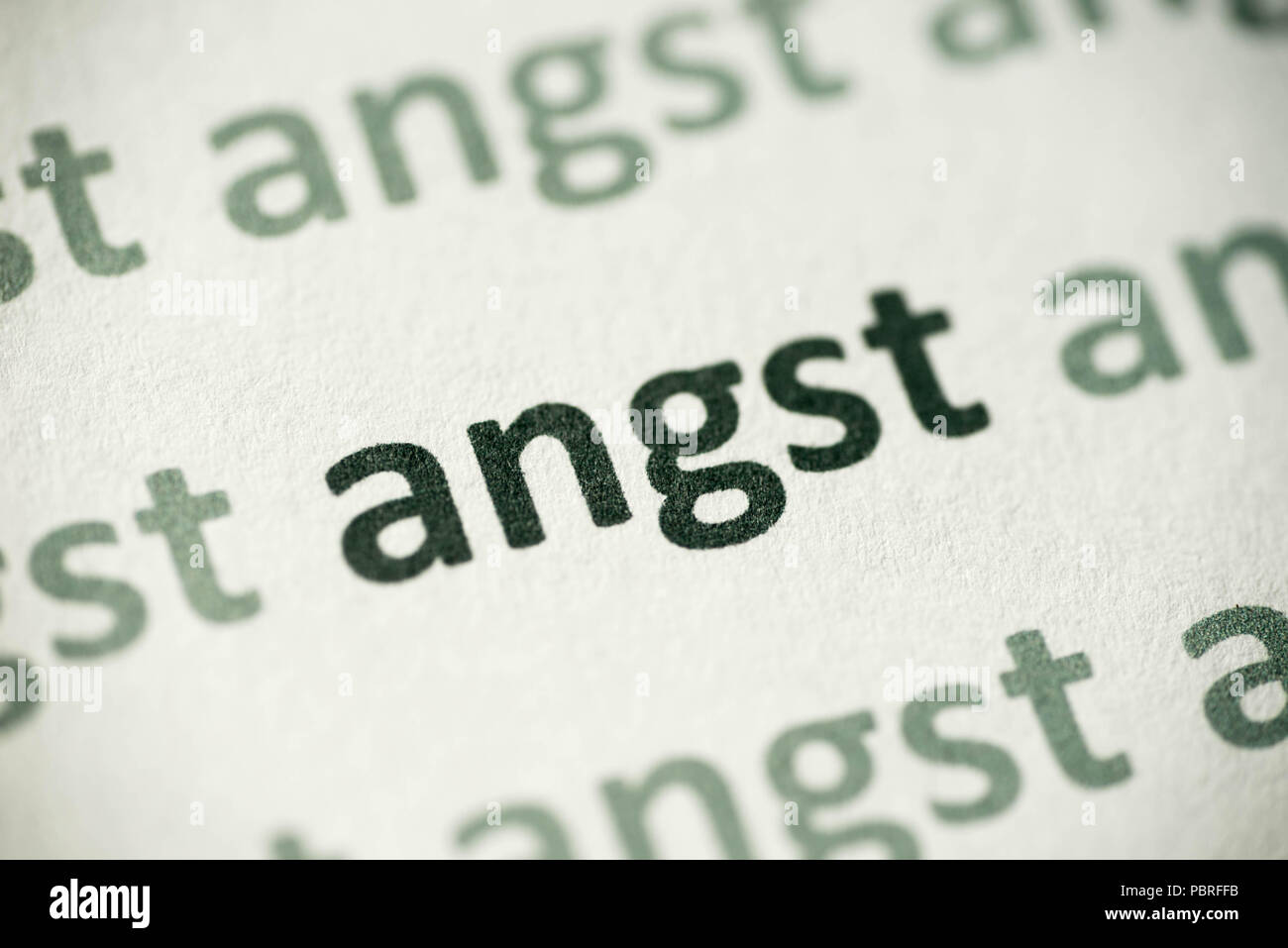 word angst printed on white paper macro Stock Photo