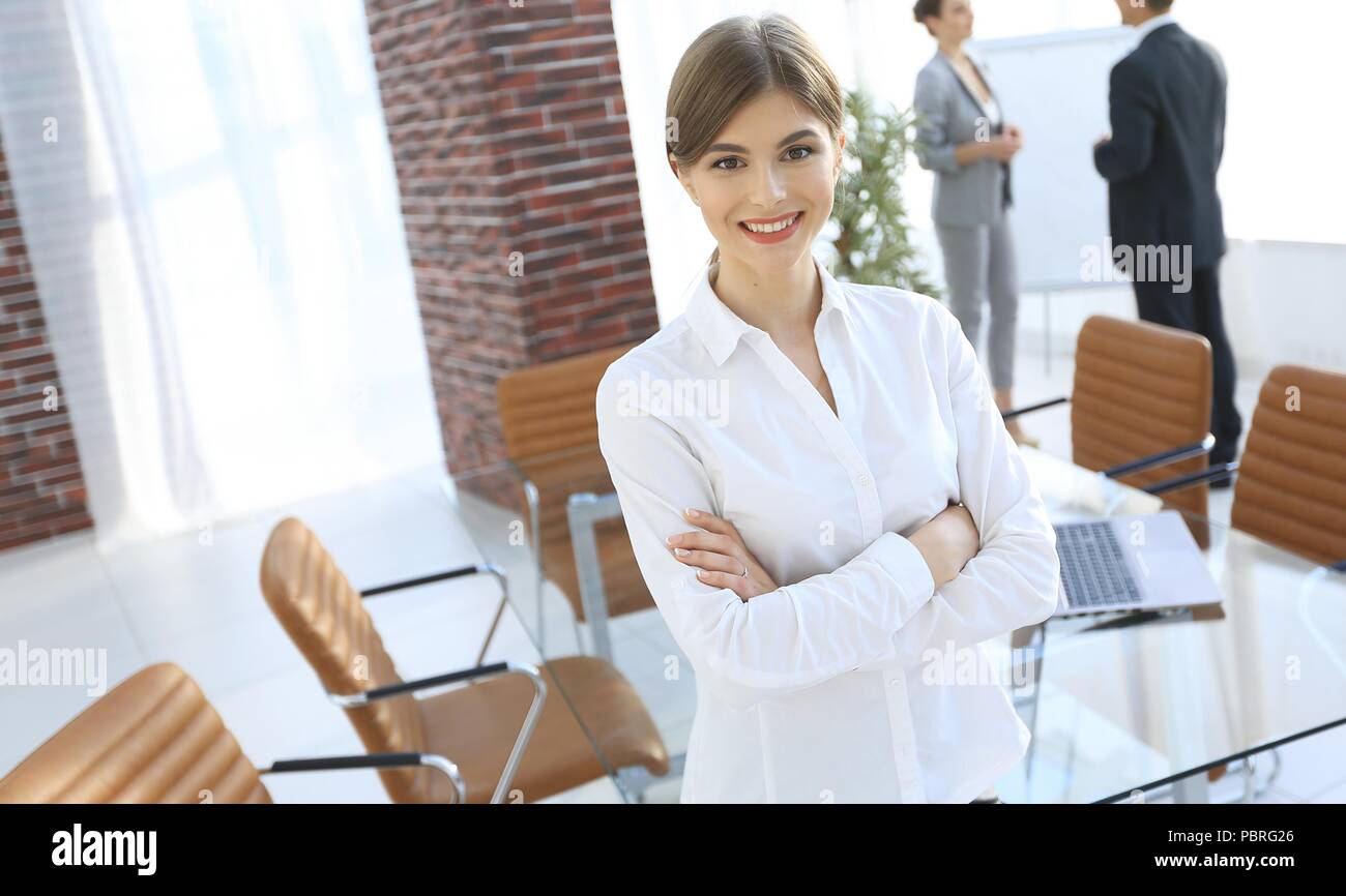 young woman assistant standing near desktop Stock Photo - Alamy