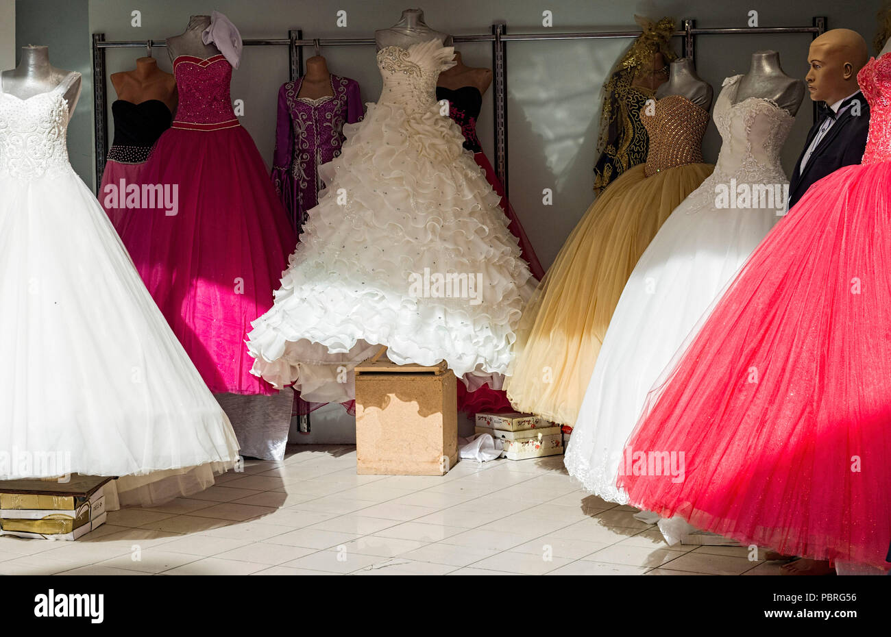 Colourful dresses in shop window in Izmir Stock Photo - Alamy