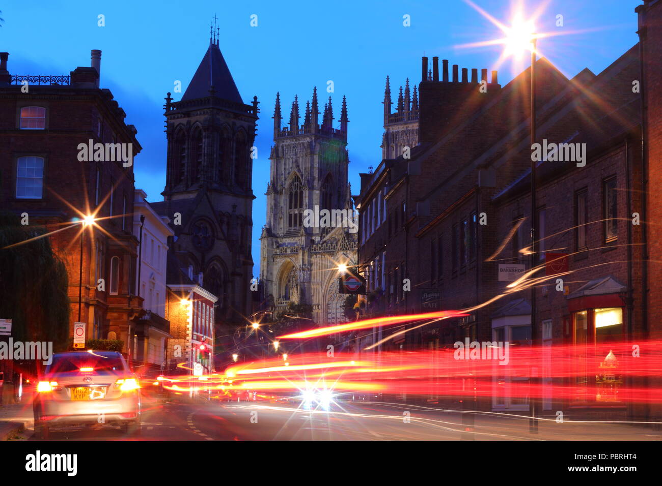 Light trails from Duncombe Place in York City Centre with York Minster ...