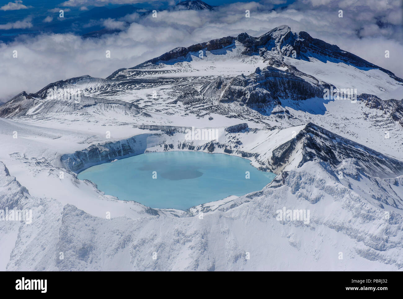 Aerial view of a tuquoise crater lake on top of Mount Ruapehu, Tongariro National Park, North Island, New Zealand Stock Photo