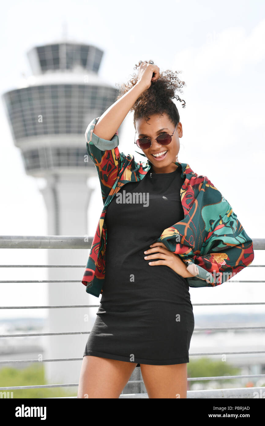 Woman at the airport hi-res stock photography and images - Alamy