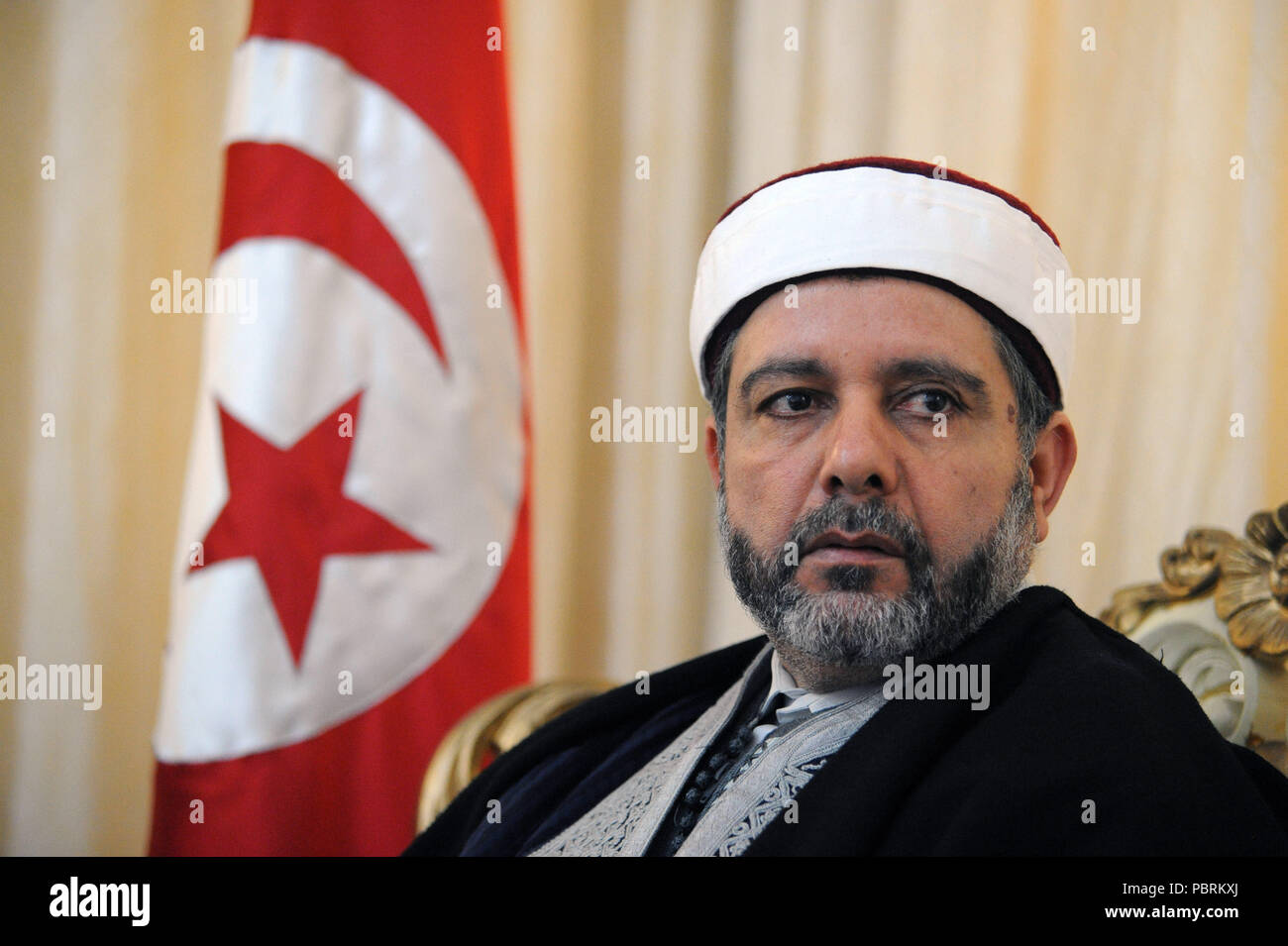 February 15, 2013 - Tunis, Tunisia: Portrait of Noureddine El Khademi, Tunisia's Minister for Religious Affairs at his office. Portrait du ministre tunisien des Affaires religieuses, Noureddine El Khademi. *** FRANCE OUT / NO SALES TO FRENCH MEDIA *** Stock Photo