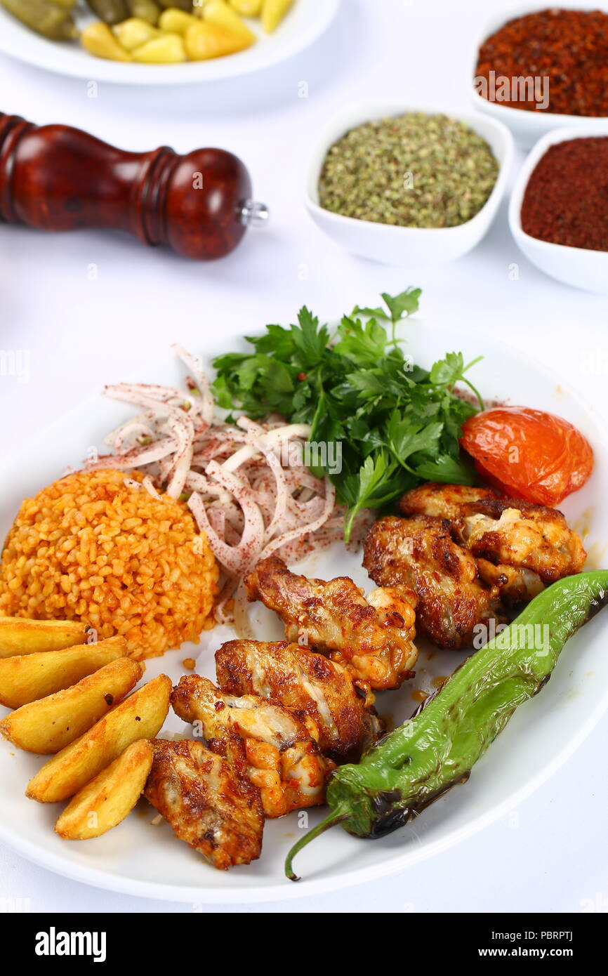 Grilled chicken kebab with rice and vegetables Stock Photo Alamy