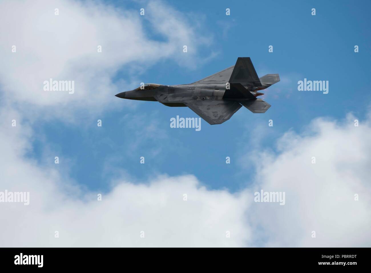 U.S. Air Force Maj. Paul 'Loco' Lopez, F-22 Raptor Demonstration Team commander/pilot, flies during a demonstration at Canadian Forces Base Cold Lake, Canada, July 22, 2018. The Cold Lake Air Show is the only visit in Canada for the Raptor this year. Stock Photo