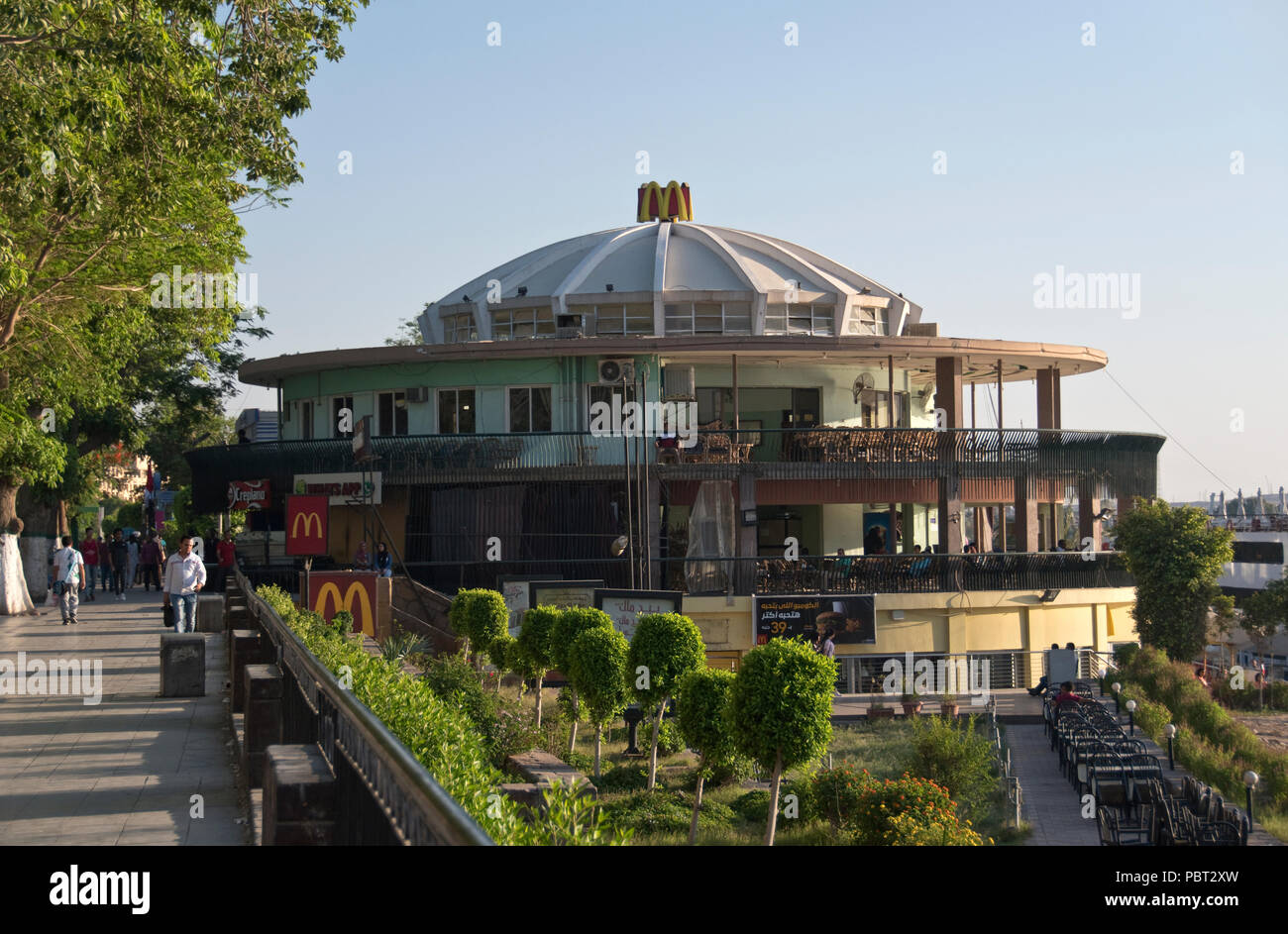 A Mcdonald S Fast Food Restaurant Stands On The Nile Riverside At Aswan Egypt Stock Photo Alamy