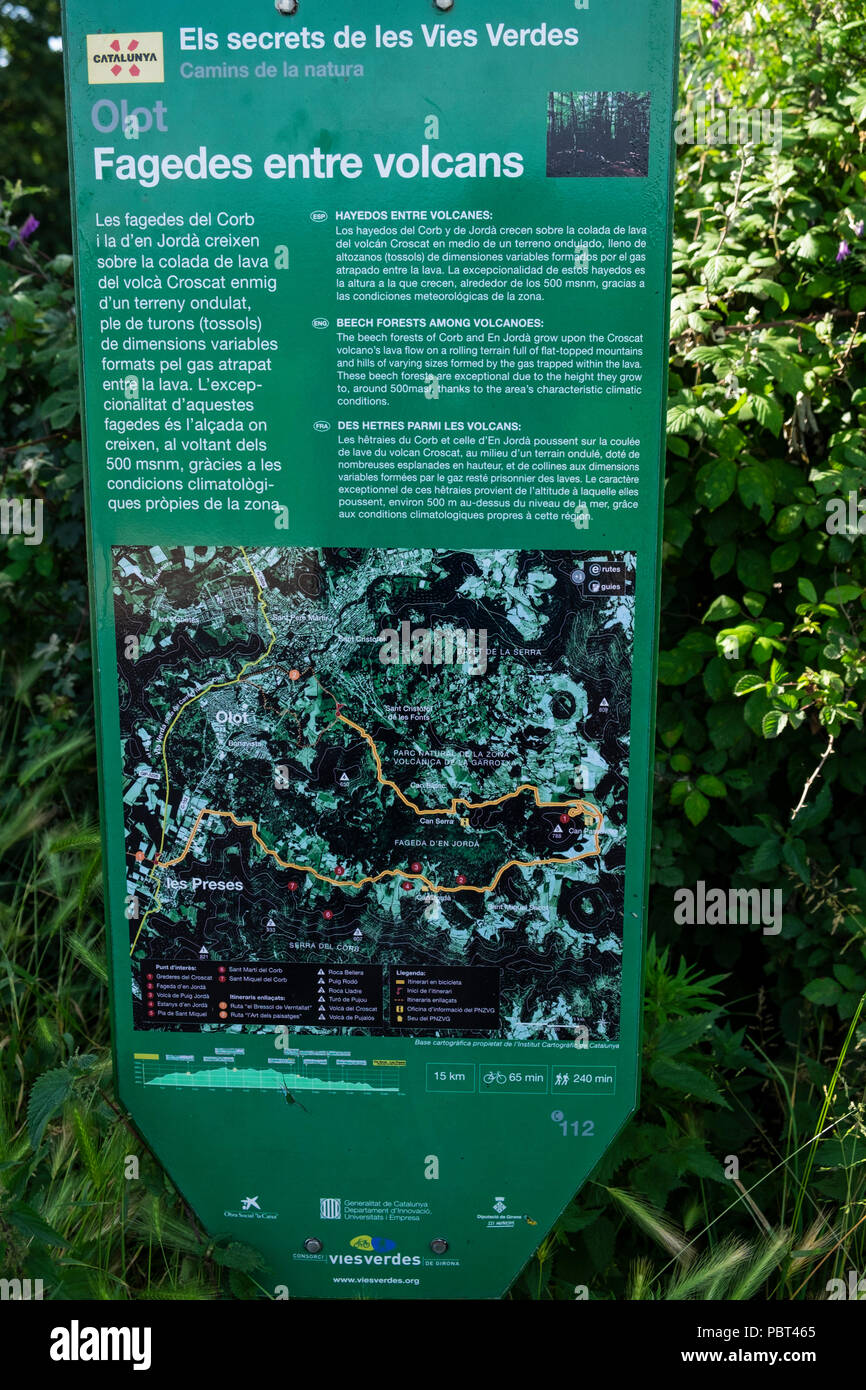 Information sign with route details of a walk through the Garrotxa volcanic zone near Olot, Catalunya, Spain Stock Photo