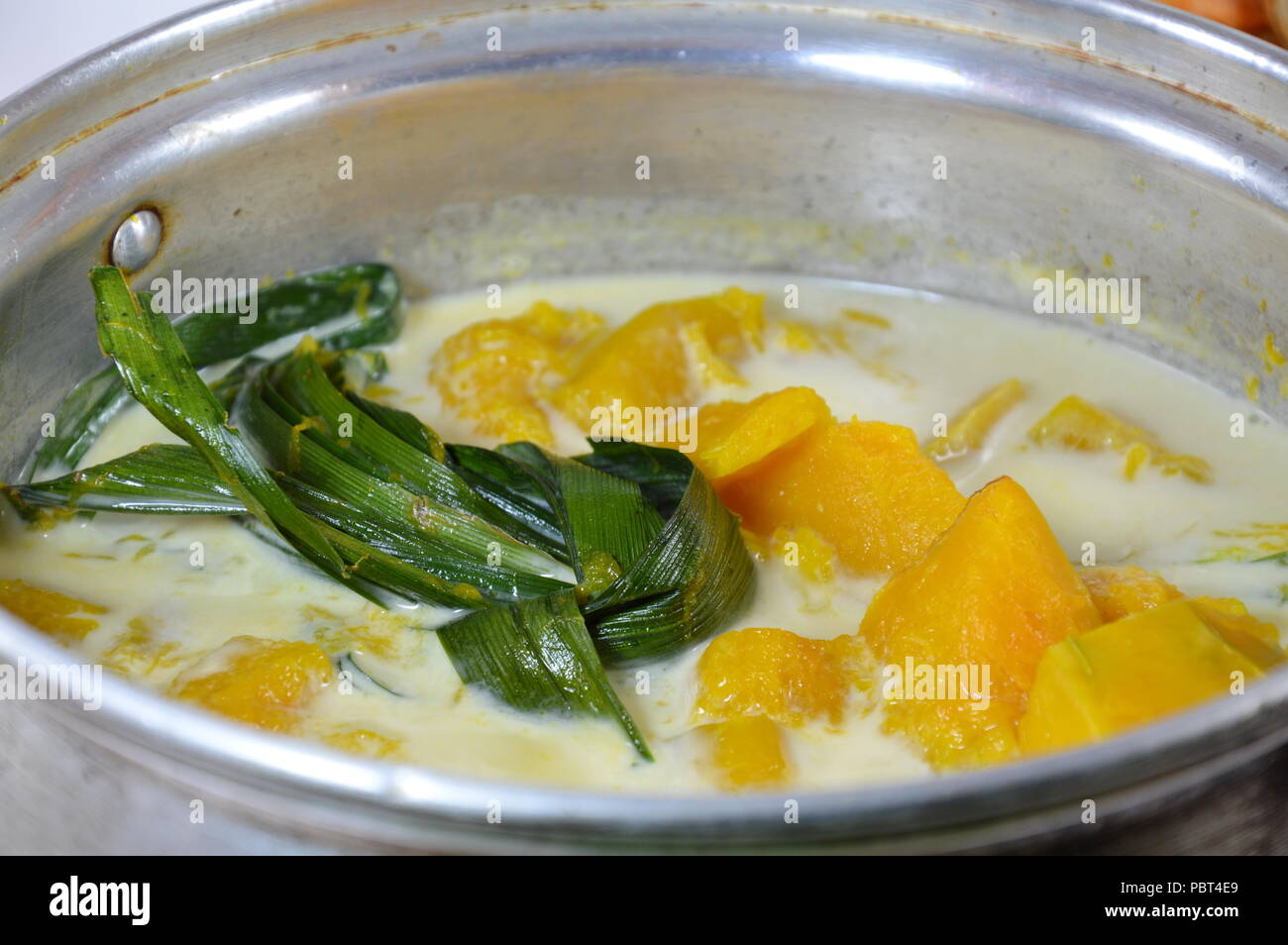 pumpkin boiled in coconut milk on pot Stock Photo Alamy