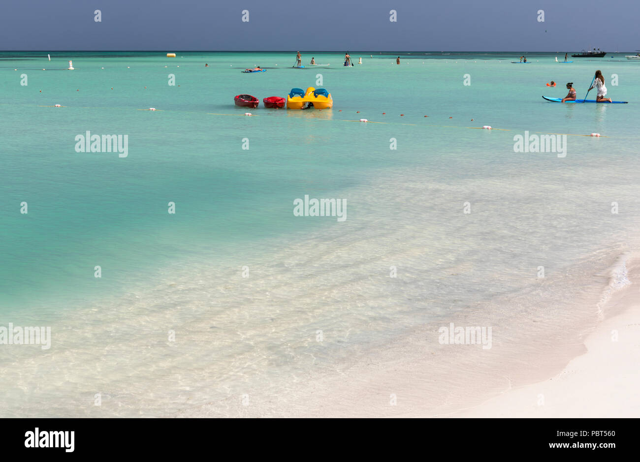 Water Sports in the turquoise Caribbean sea at Palm Beach, Aruba, Caribbean Stock Photo