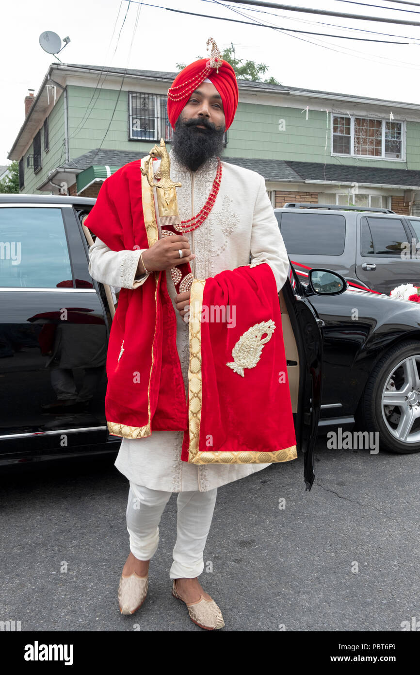 A groom arrives at the Sikh Cultural Center for his own wedding in Richmond Hill, Queens, New York. Stock Photo