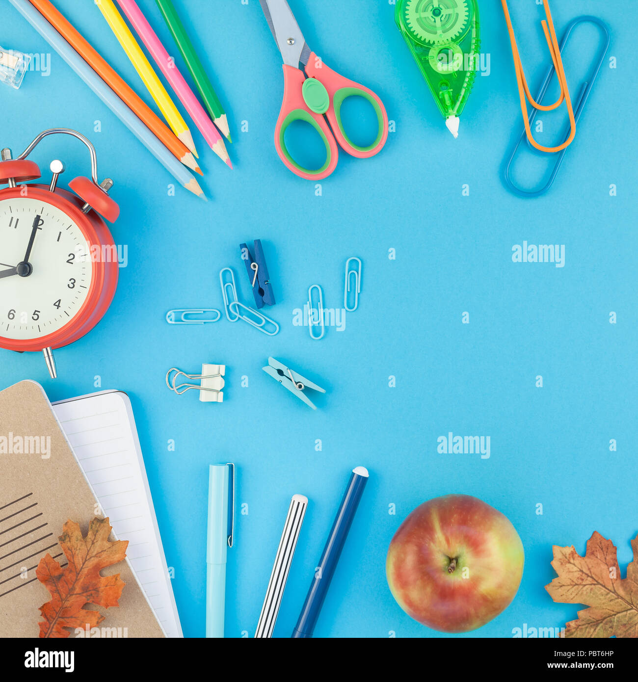 Square Creative flat lay top view back to school concept with alarm ...