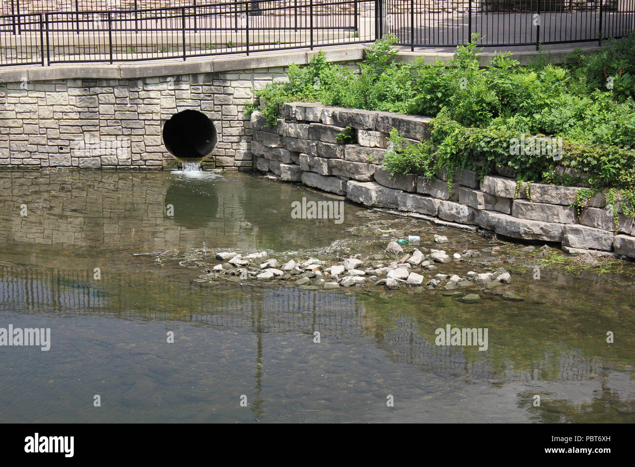 Stormwater Drainage Culvert On The Dupage River Walk In Chicago Suburb Stormwater Drainage Culvert On The Dupage River Walk In Chicago Suburb