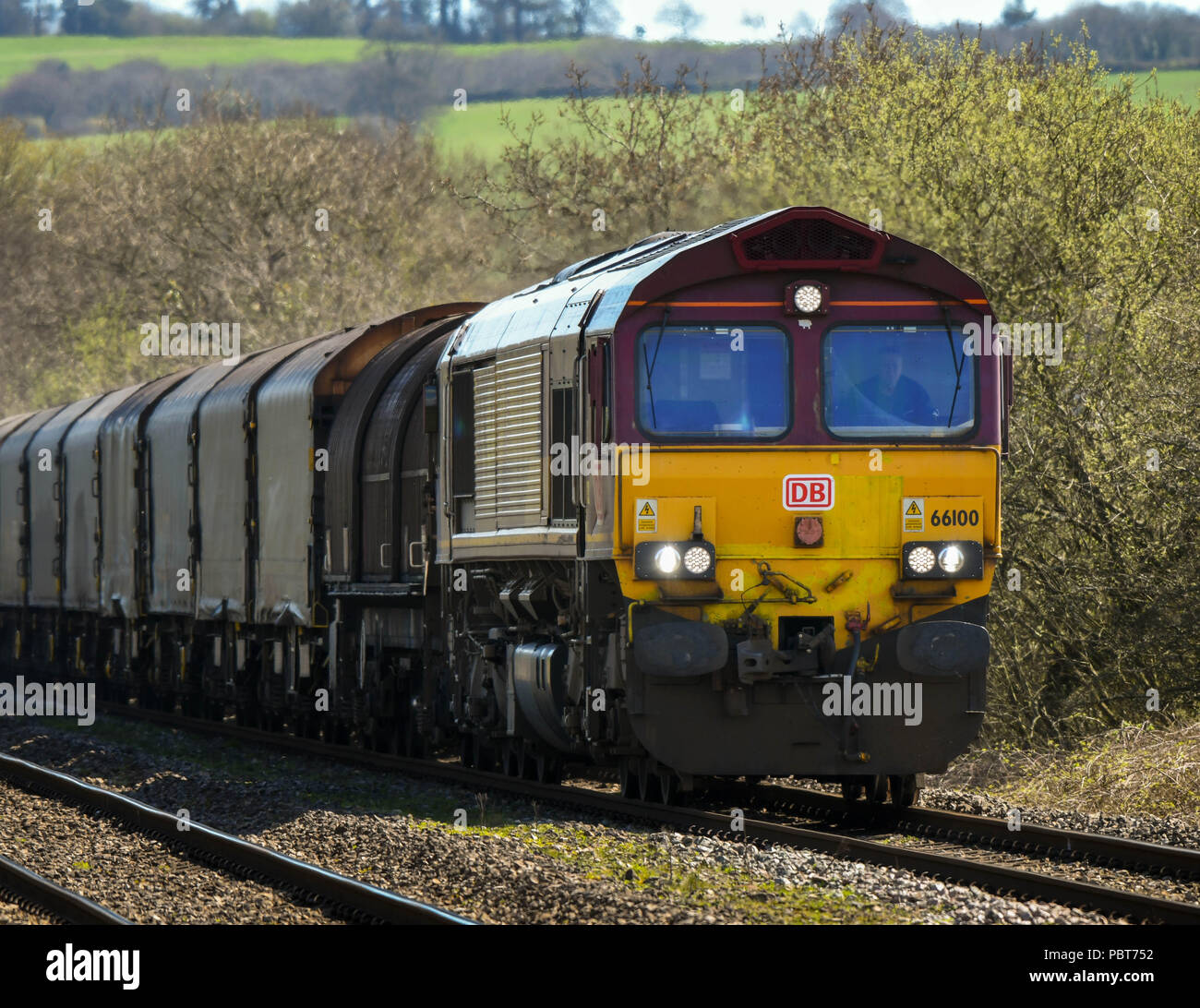 Heavy diesel electric rail freight hauling a train of wagons Stock Photo Alamy