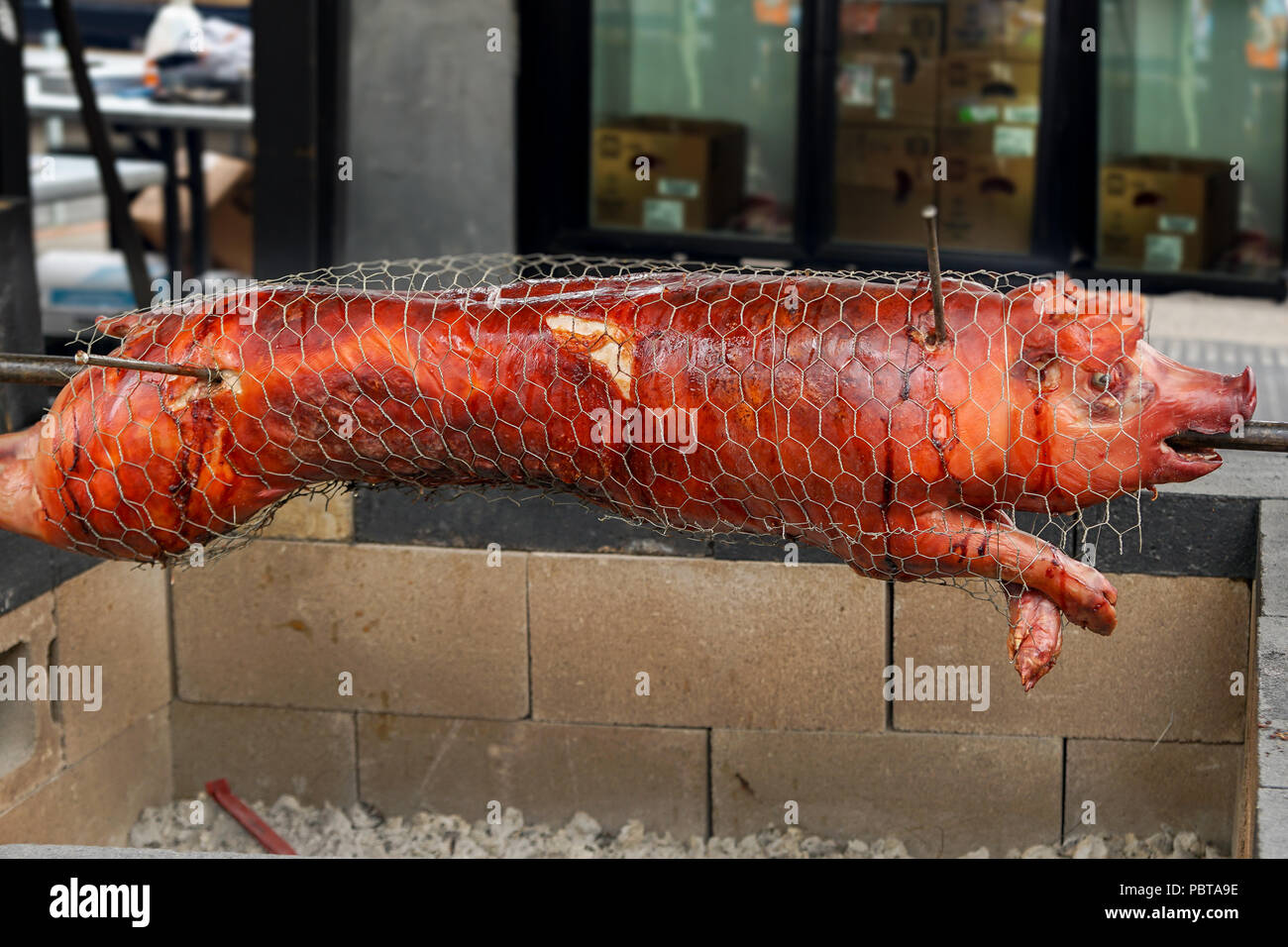 BBQ Hog on spit pig barbeque Stock Photo