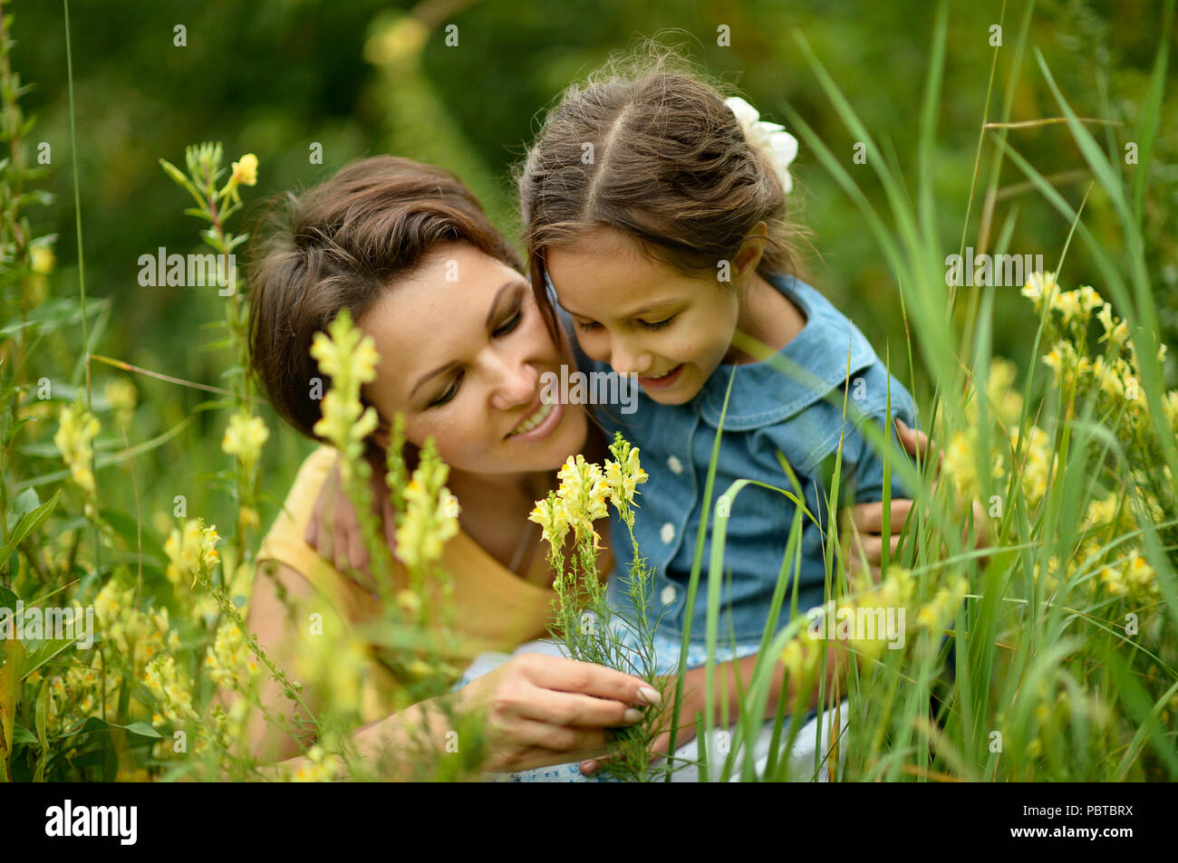 mother and daughter at field Stock Photo Alamy