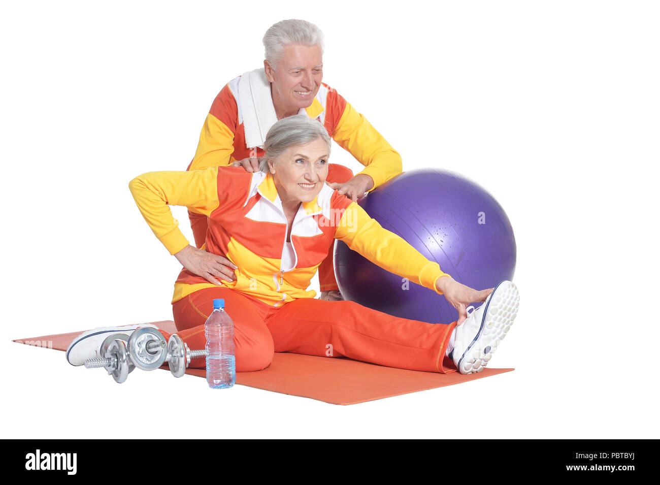 Portrait of Senior Couple Exercising Stock Photo