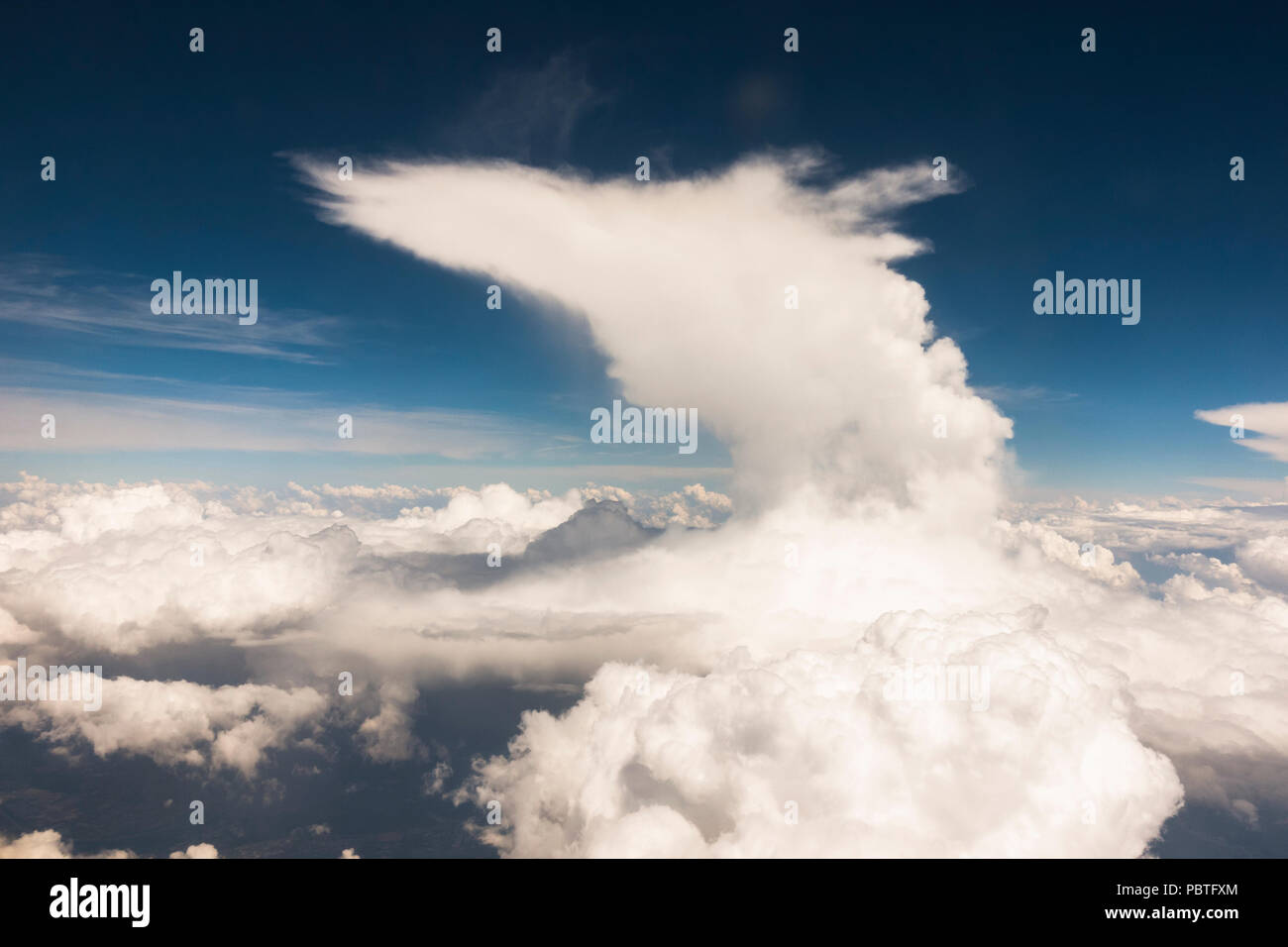 Cloud types, Cumulus clouds and nimbostratus, altostratus clouds, above France. Stock Photo