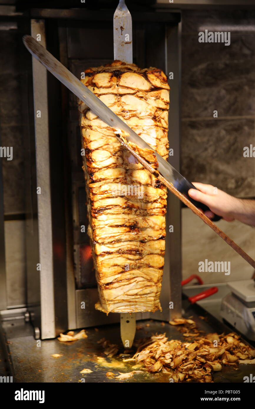 Gyros, grilled doner shawarma kebab slowly on rotating spit Stock Photo Alamy