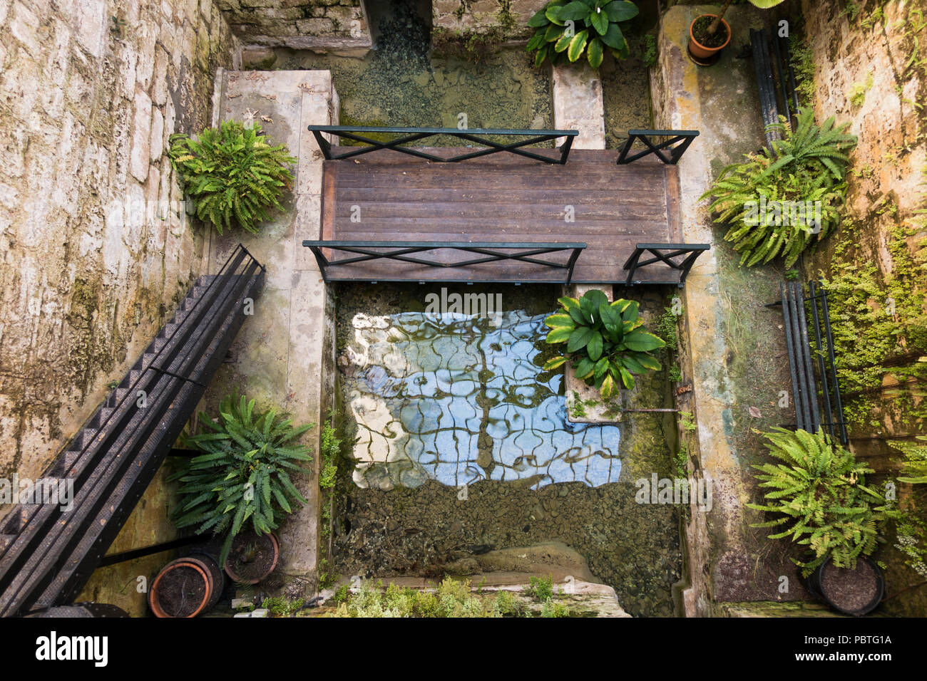 Interior wells of the renovated flower mill at Botanical garden, Molino de Inca, Torremolinos, Andalusia, Spain. Stock Photo