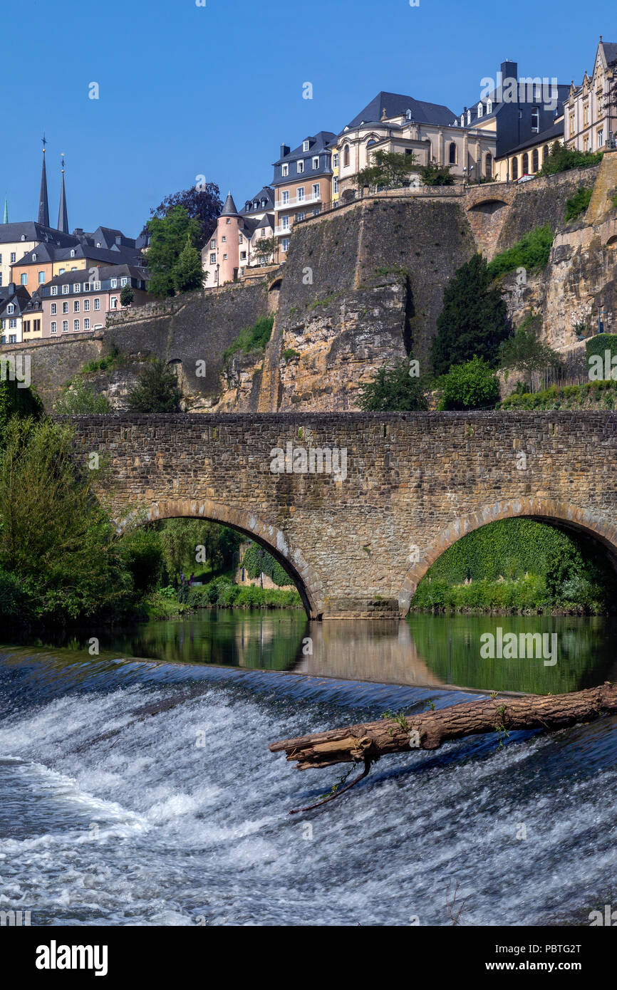 Luxembourg City - Ville de Luxembourg. The walls of the old town viewed from the Grund area of the city. Stock Photo