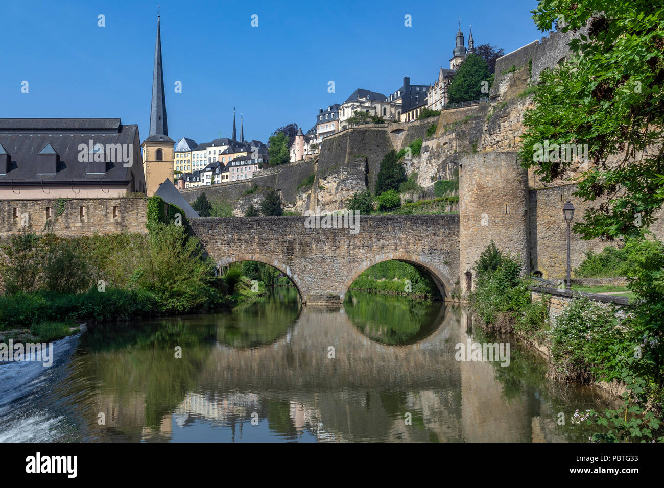 Luxembourg City - Ville de Luxembourg. The walls of the old town viewed from the Grund area of the city. Stock Photo