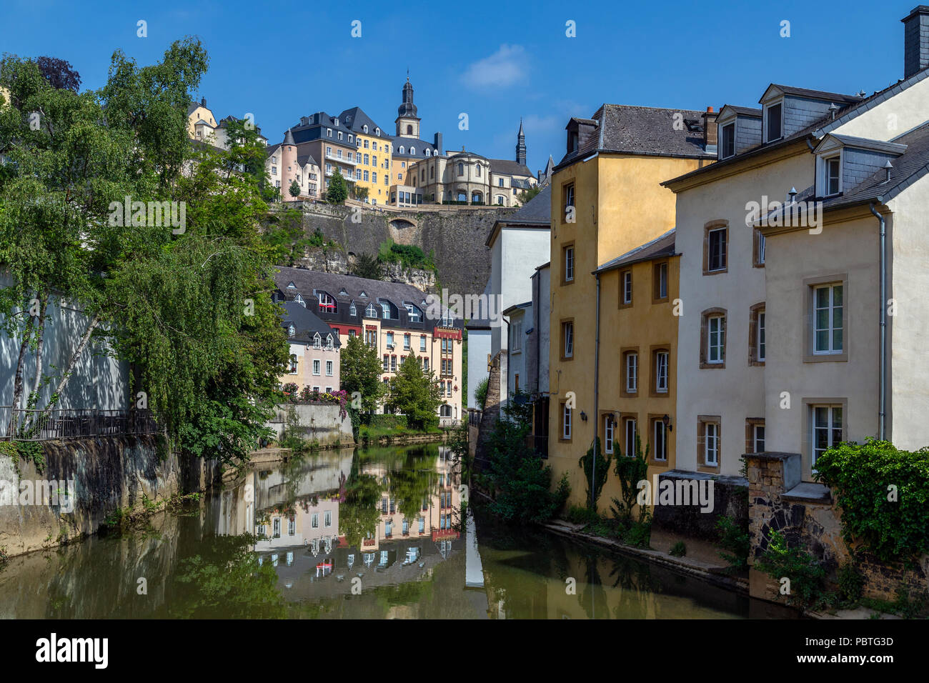 Luxembourg City - Ville de Luxembourg. The walls of the old town viewed from the Grund area of the city. Stock Photo