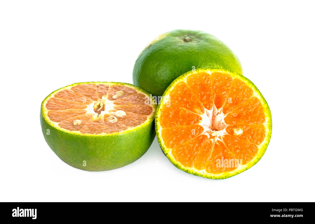 green tangerine on white background Stock Photo Alamy
