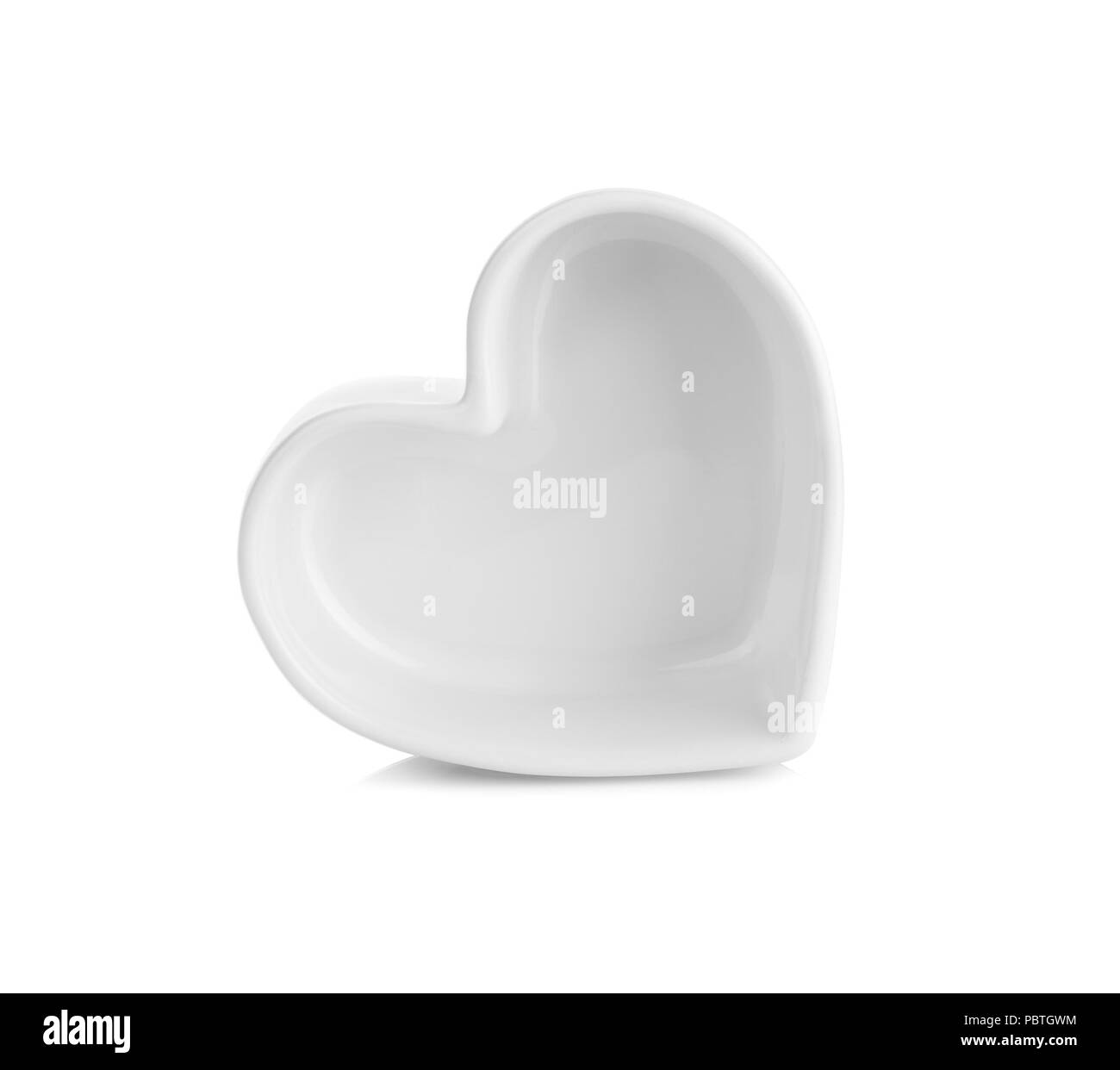 white heart shaped ceramic bowls isolated on white background Stock