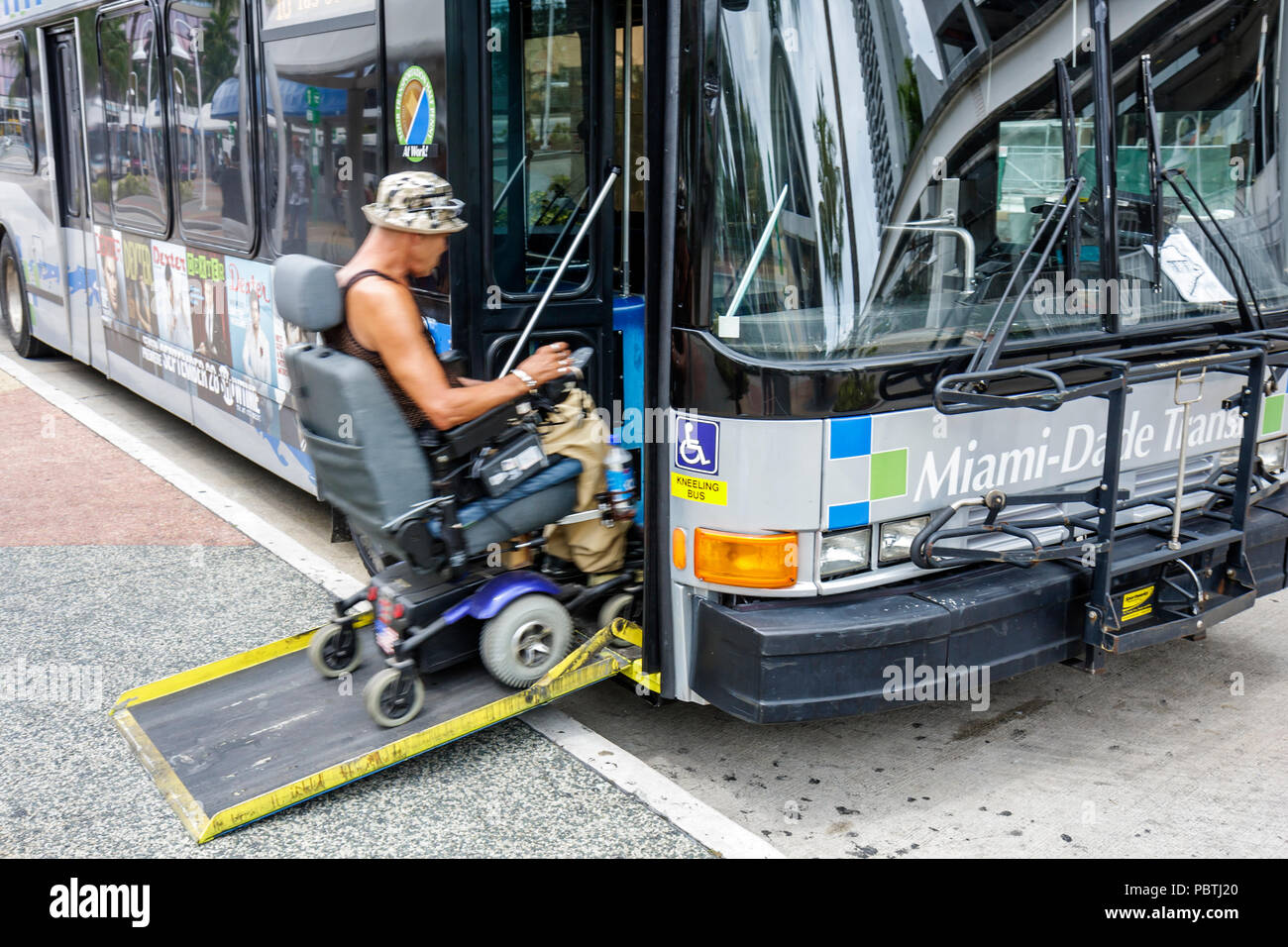 Miami Floridabus Mass Transit Adult Man Passenger Riderelectric Wheelchairphysically 