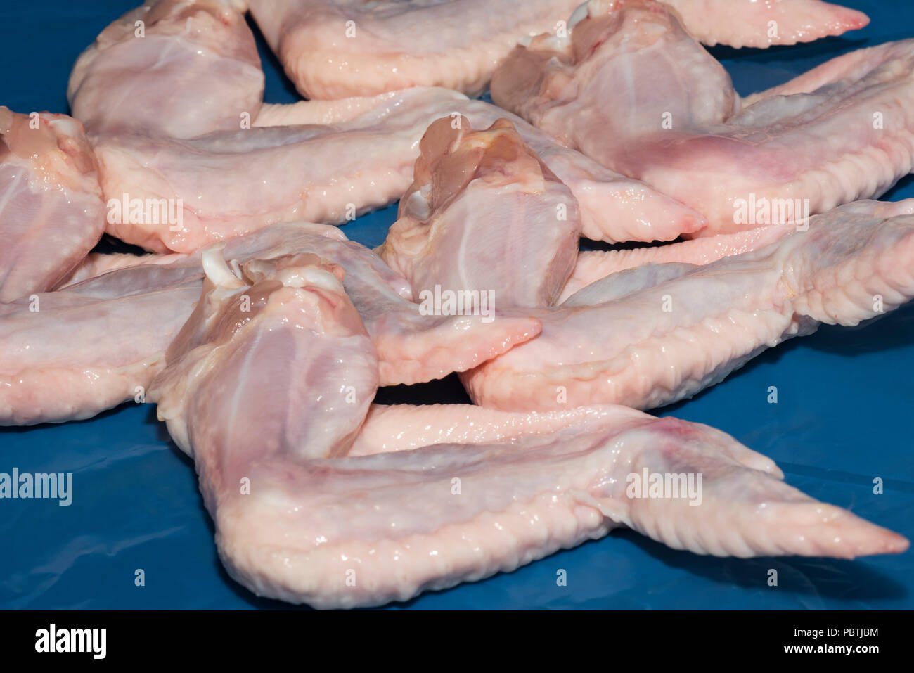 An Uncooked Chicken Wing High Resolution Stock Photography and Images