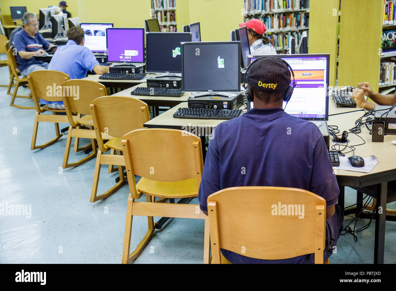 Miami Beach Florida,South Shore Public Library,desks,computers,chairs,monitors,Internet,access,free visitors travel traveling tour tourist tourism lan Stock Photo