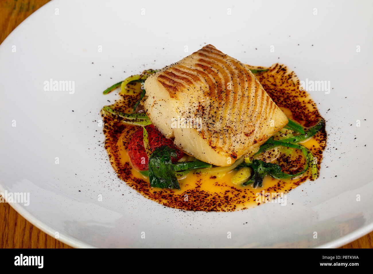 Roasted fish halibut with spices Stock Photo Alamy