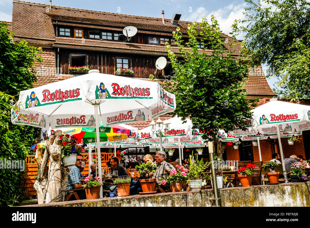 Beer garden umbrellas outside the rathaus in modern Nurtingen, Southern