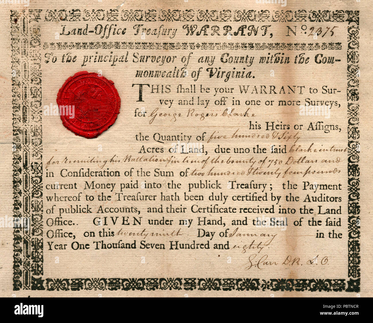 Land Office Treasury Warrant no. 2375 in the name of George Rogers Clark directing the principal surveyor of any Virginia county to lay off one or more surveys totaling 560 acres. The state of Virginia owed Clark acreage for recruiting a battalion and in lieu of a $750 bounty. Stock Photo
