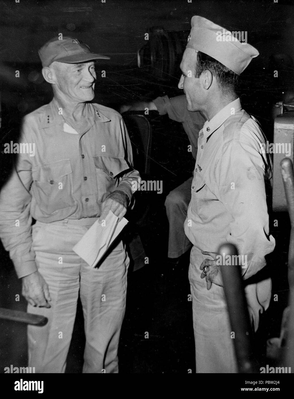 Admiral Mitscher speaking with David McCampbell. Stock Photo