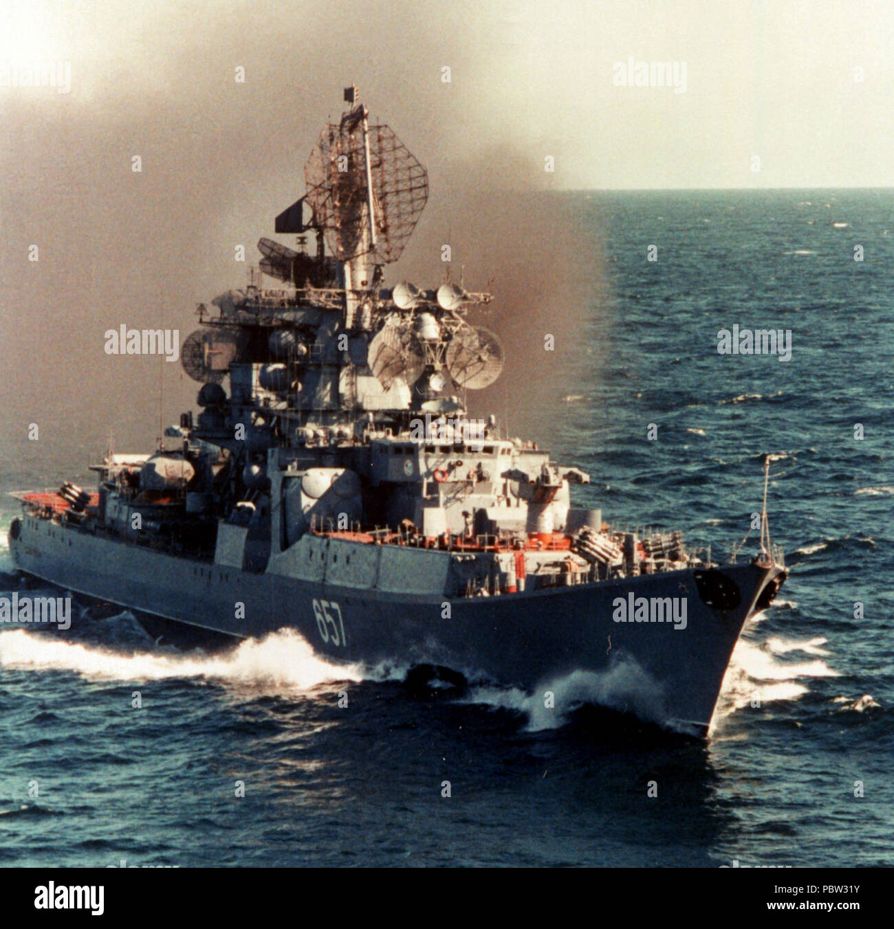 AdmiralYumashev1982a. A starboard bow view of the Soviet Kresta II Class guided missile cruiser ADMIRAL YUMASHEV underway. Stock Photo