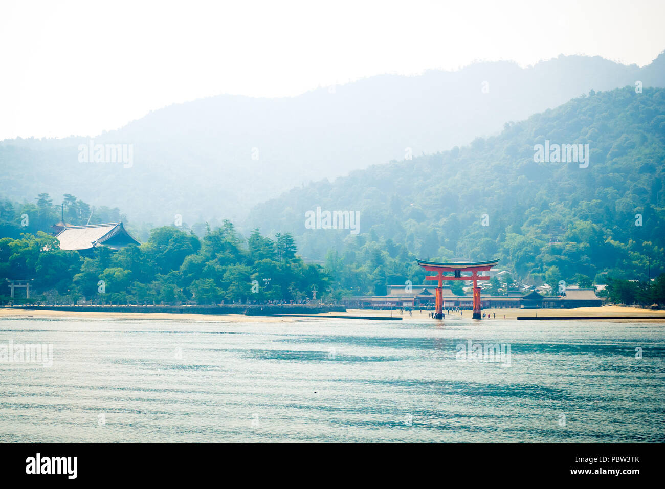 The famous floating torii gate of Itsukushima Shrine (Itsukushima-jinja) on the island of Miyajima (Itsukushima) in Hiroshima Prefecture, Japan. Stock Photo