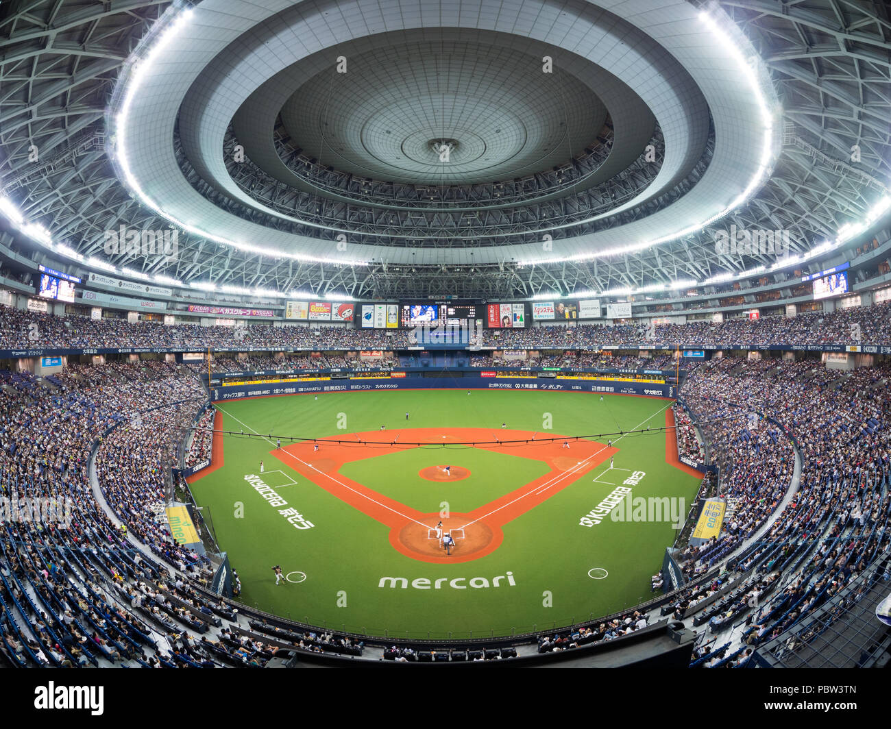 The Osaka Orix Buffaloes play the Hokkaido Nippon Ham Fighters in the Kyocera Osaka Dome in Pacific League Japanese professional baseball action. Stock Photo