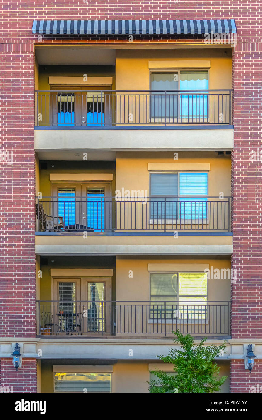 Views of three balconies on apartment building Stock Photo - Alamy