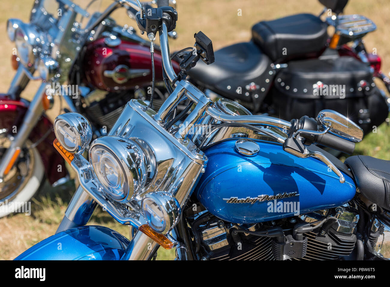 two Harley Davidson motorcycles with chrome and metallic paints. Chopper motorcycles. Stock Photo