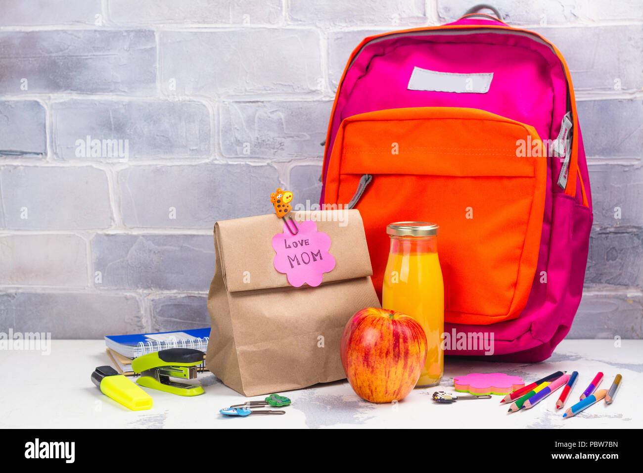 School lunch box and pink backpack Stock Photo Alamy