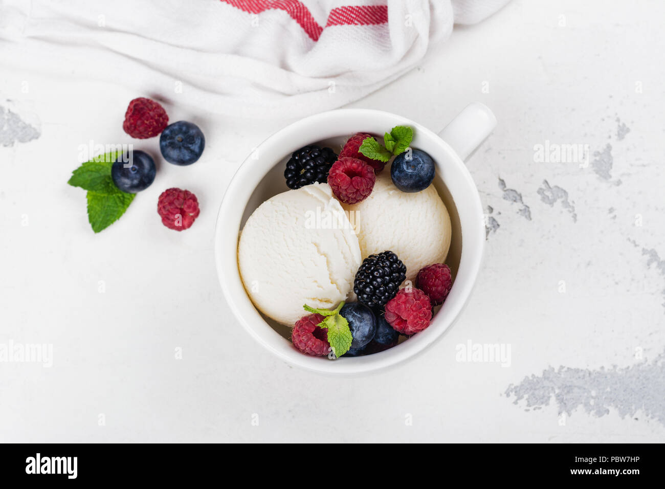 Vanilla ice cream with berries Stock Photo - Alamy