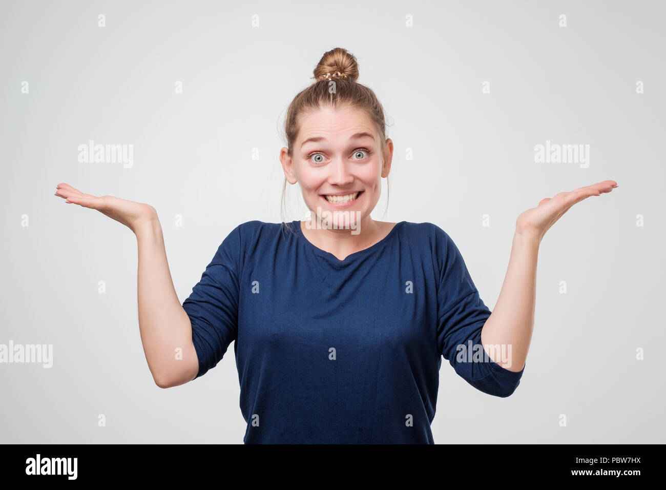 Human face expressions and emotions. Portrait of young desperate european woman with mouth wide open. Stock Photo