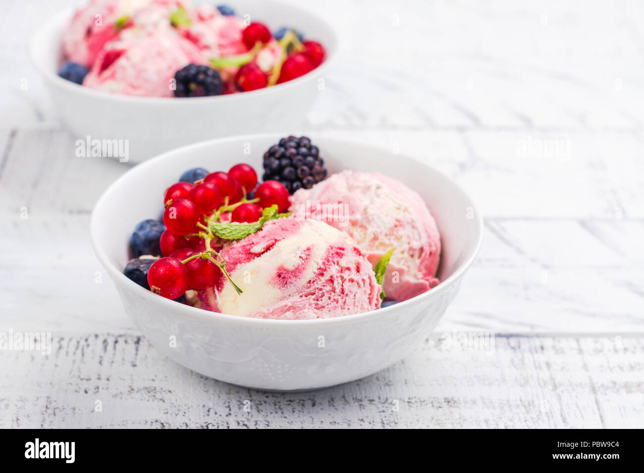 Raspberry and vanilla ice cream Stock Photo Alamy