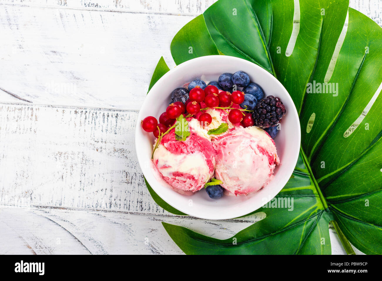 Raspberry and vanilla ice cream Stock Photo Alamy