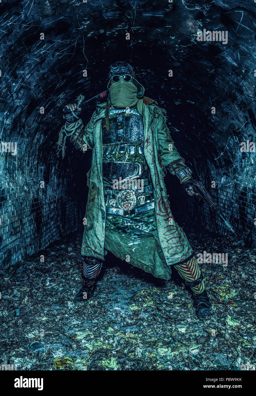 Post apocalyptic survivor in abandoned tunnel Stock Photo