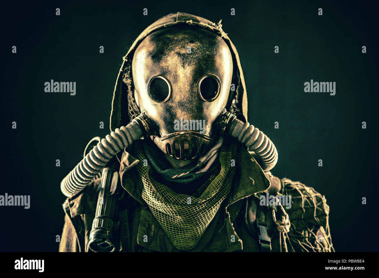 Portrait of post apocalyptic survivor in gas mask Stock Photo