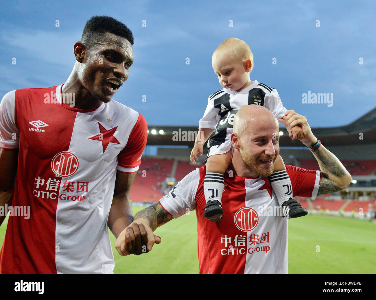 Prague, Czech Republic. 14th Apr, 2019. L-R Simon Deli (Slavia) and  Benjamin Tetteh (Sparta) are seen during the Czech first soccer league  (Fortuna Liga), 28th round, match SK Slavia Praha vs AC