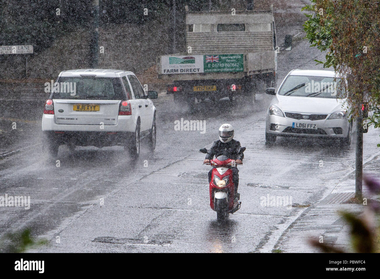 Motorcycle in rain hi-res stock photography and images - Alamy
