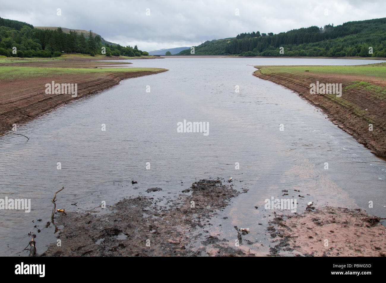 Llwyn Onn reservoir, Merthyr Tydfil, South Wales, UK.  30 July 2018.  UK weather: After just 3 days of heavy rain, levels in this reservoir are significantly higher than when it was pictured a week ago.   Credit: Andrew Bartlett/Alamy Live News Stock Photo